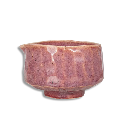 Rust-colored ceramic bowl on a white background