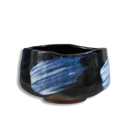Black and blue ceramic bowl on a white background