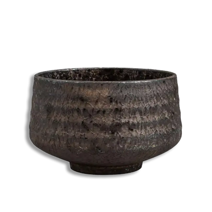Dark brown ceramic pot on a white background