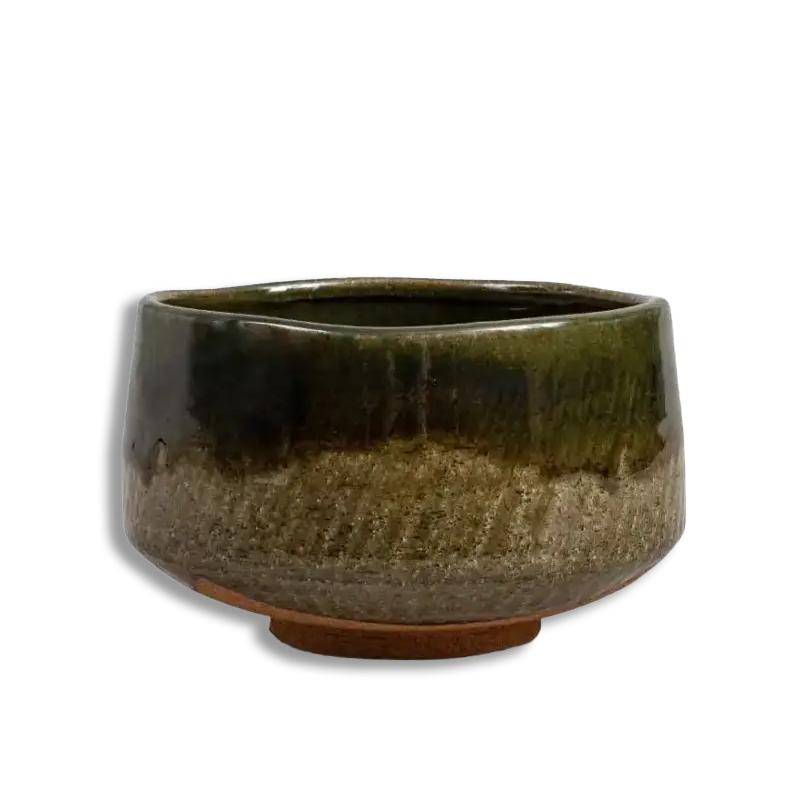 Green ceramic pot on a white background