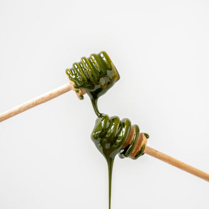 Organic honey infused with Moya matcha for a sweet, earthy spread or natural sweetener