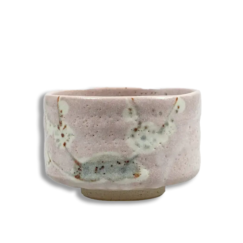 Ceramic cup with a speckled design on a white background